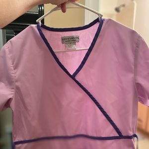 Purple scrub top size xs with tie in the back